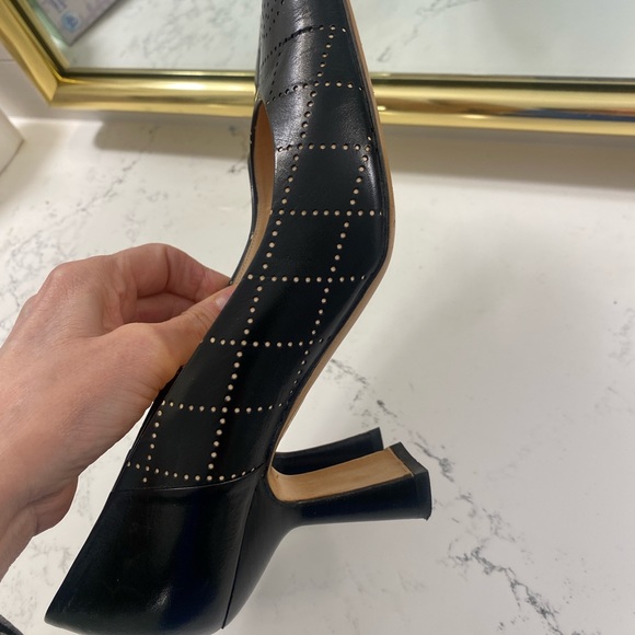 Gorgeous CHANEL heels black with bone colored quilting and CC monogram at toes. - Picture 7 of 13